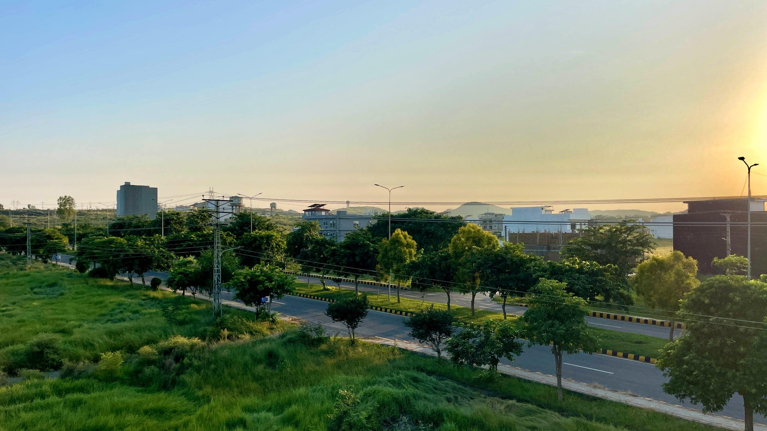Fatima Jinnah Boulevard at sunset, AWT Housing Scheme D-18, Islamabad.