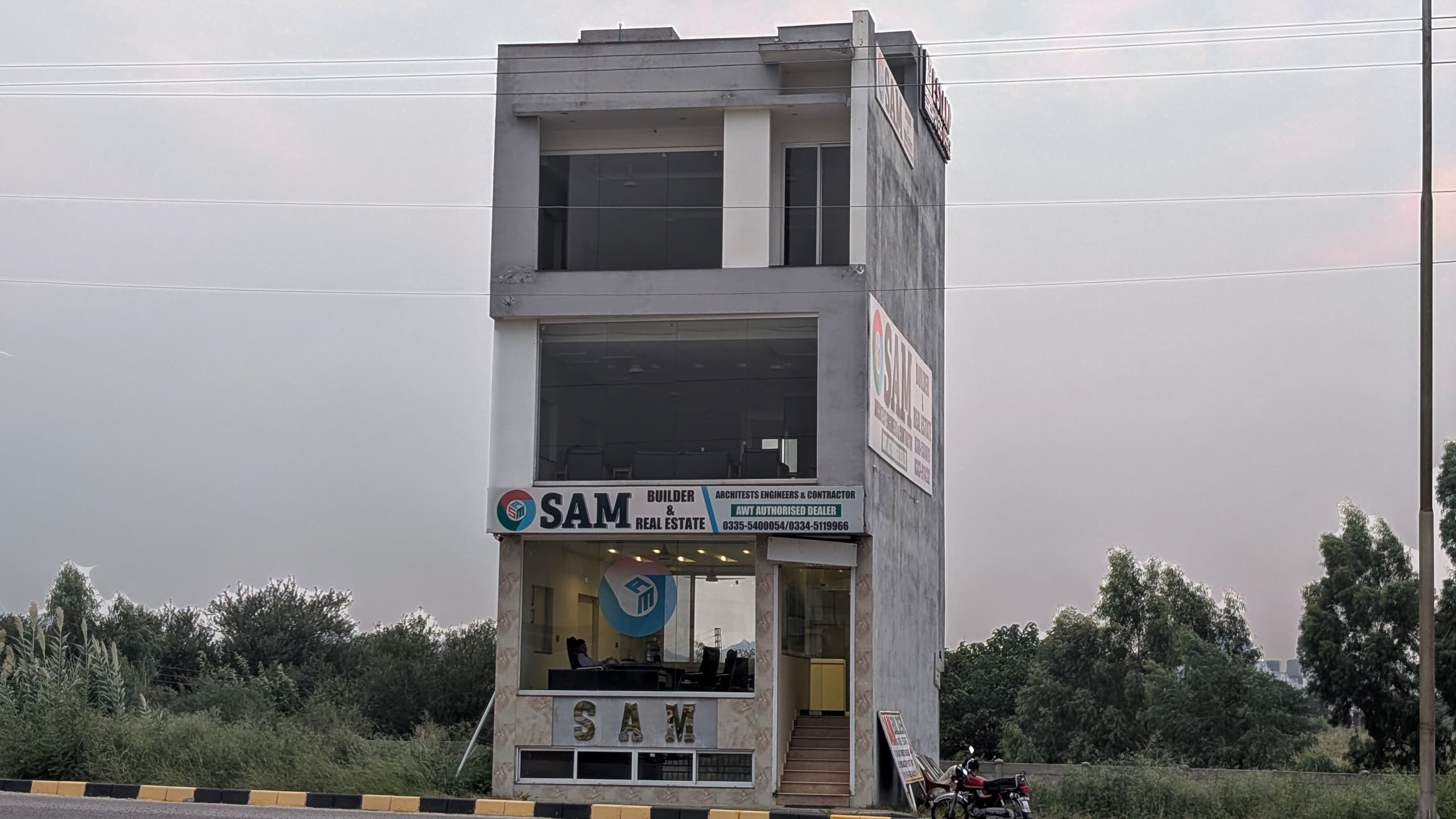 SAM Builder Block C office on Quaid-e-Azam Boulevard, AWT D-18 Islamabad